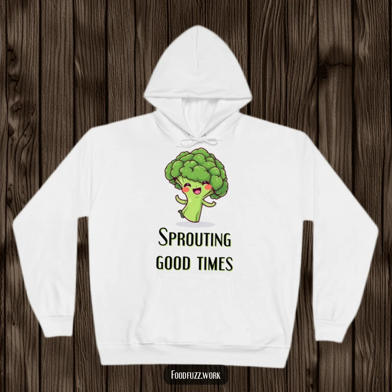 Funny Broccoli Floret Hoodie: Soft, warm apparel featuring a cheerful green broccoli doing a dynamic, playful spin, embodying fun and health.